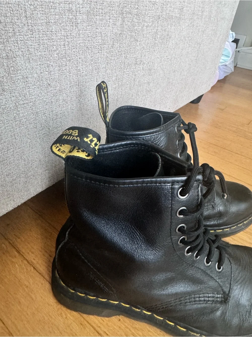 Dr. Martens Black Leather 8-Eye Lace-Up Ankle Boots with Yellow Stitching